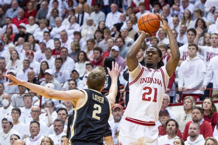 Indiana Hoosiers forward Mackenzie Mgbako (21) shoots the ball while Purdue Boilermakers guard Fletcher Loyer (2) defends in the first half at Simon Skjodt Assembly Hall.
